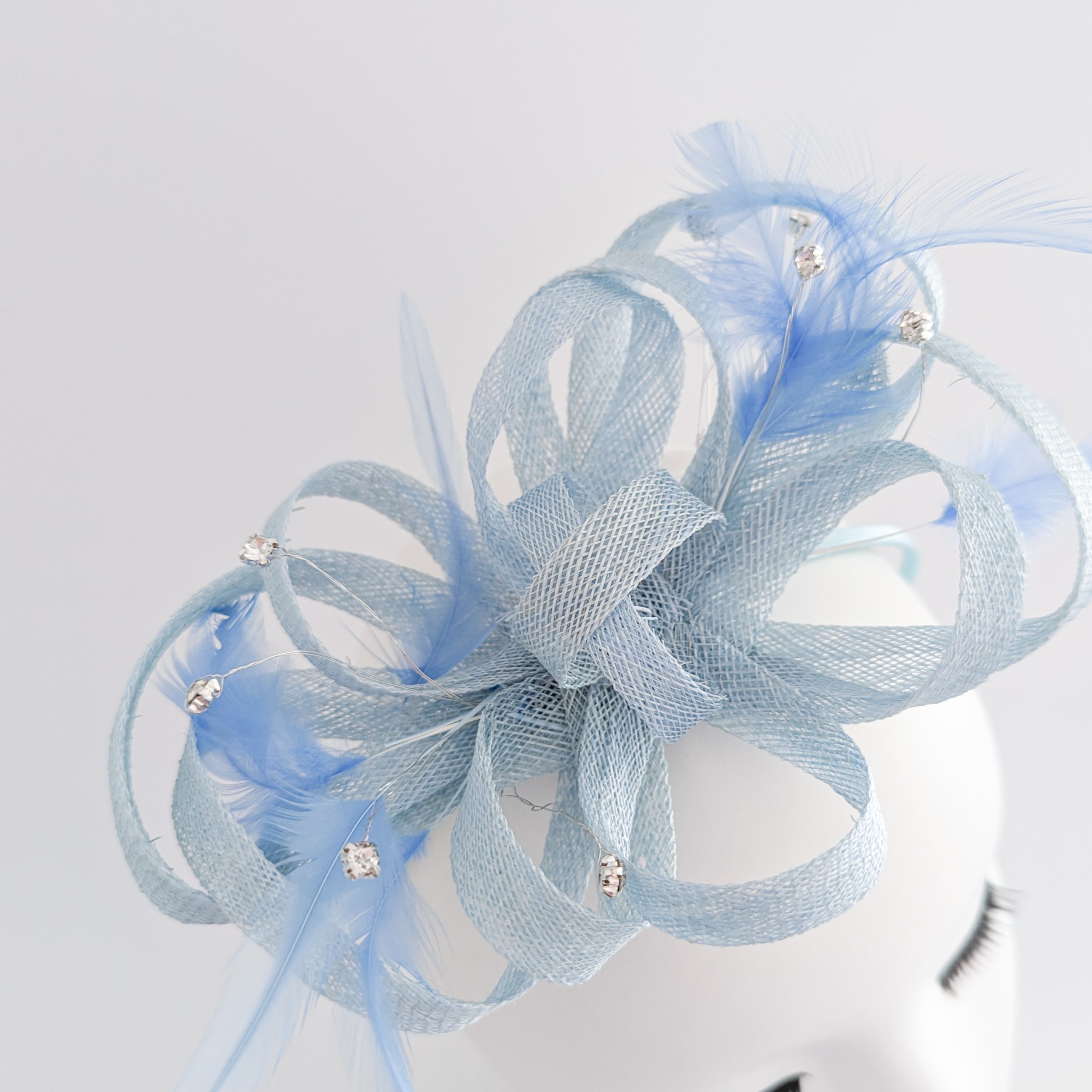 Aquamarine blue crystal feather fascinator hat