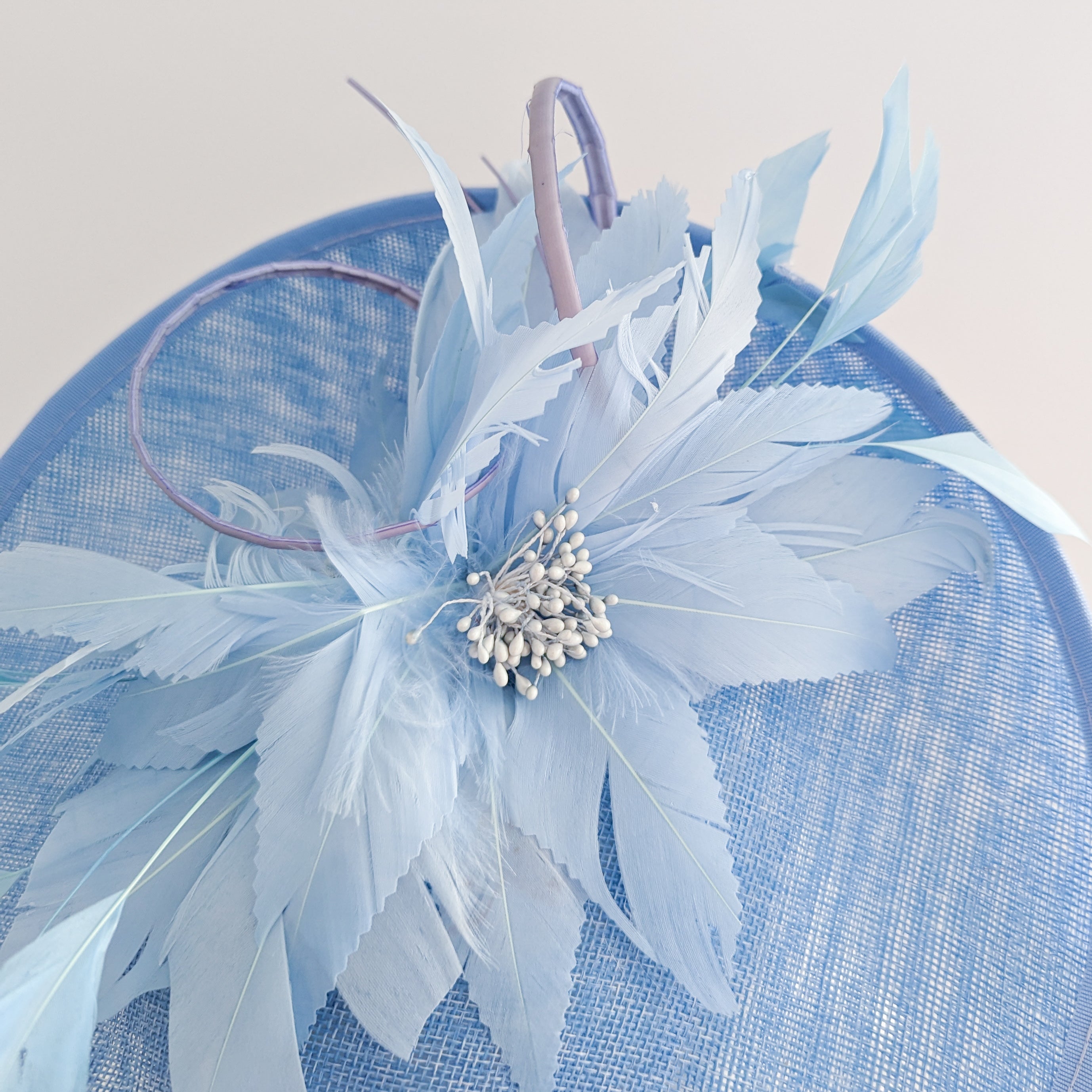 Light cornflower blue large feather saucer disc fascinator hat Light cornflower blue large feather saucer disc fascinator hat