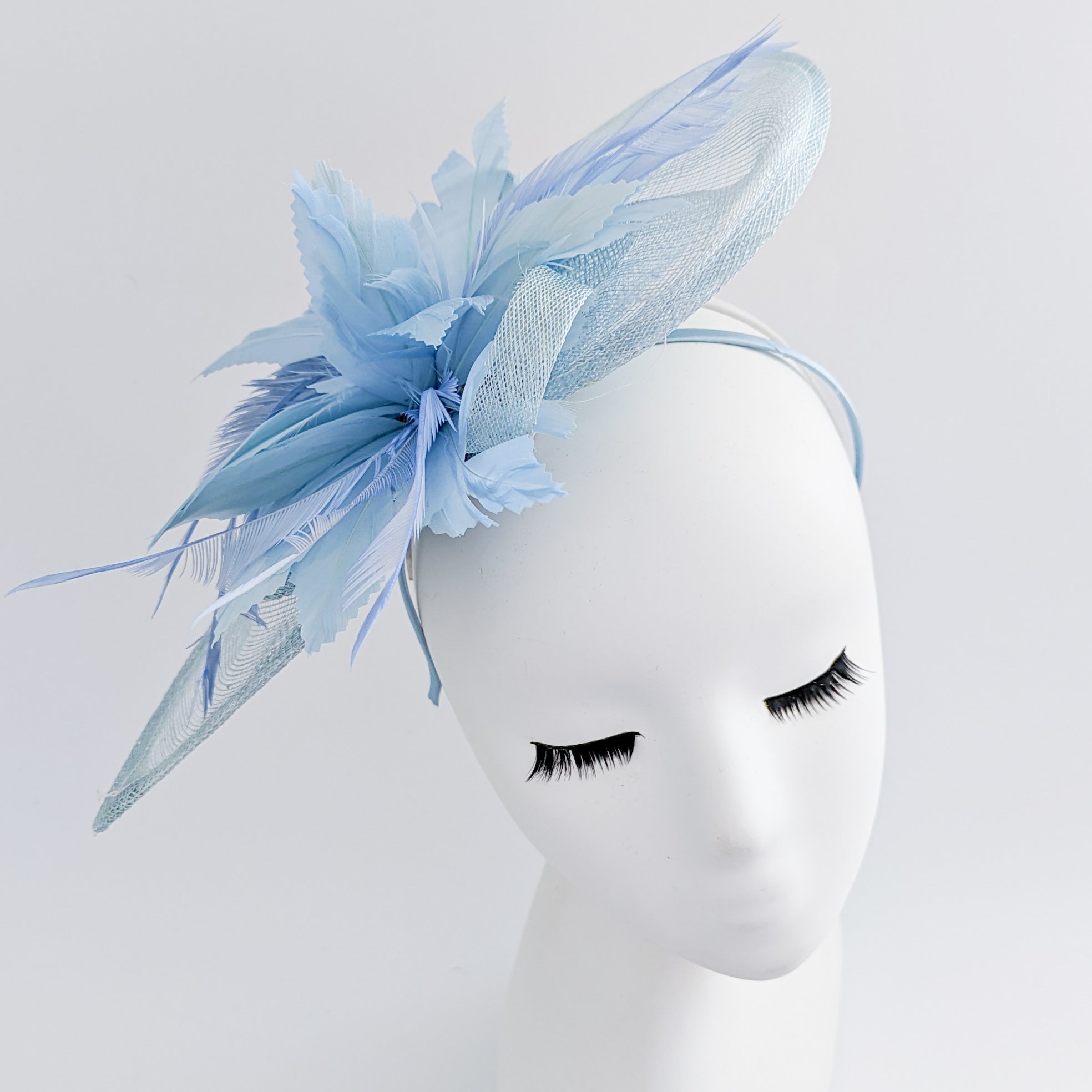 Aquamarine blue feather large teardrop fascinator hat Aquamarine blue feather large teardrop fascinator hat