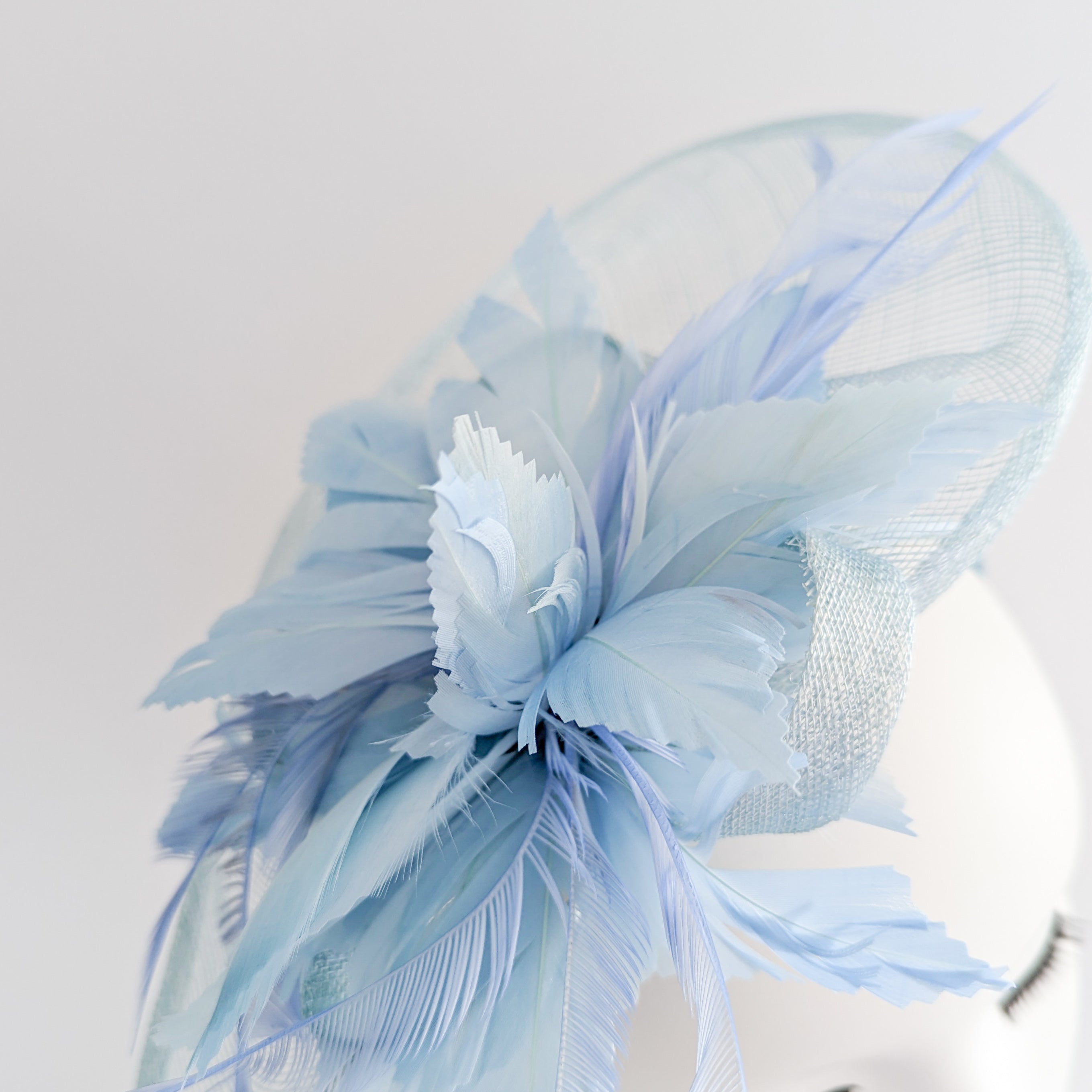 Aquamarine blue feather large teardrop fascinator hat Aquamarine blue feather large teardrop fascinator hat
