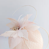 Peach feather satin fascinator hat