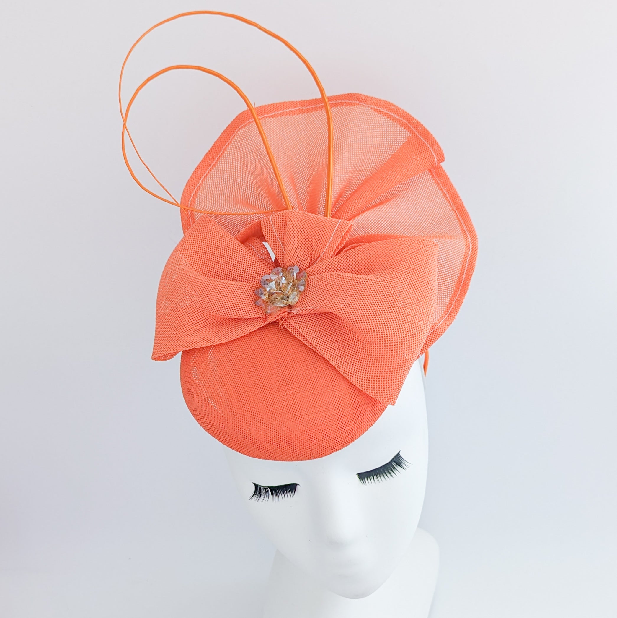 Coral orange crystal bow fascinator hat Coral orange crystal bow fascinator hat