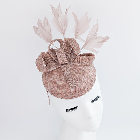 Blush pink feather fascinator hat