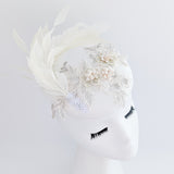 Cream feather lace satin fascinator hat Cream feather lace satin fascinator hat