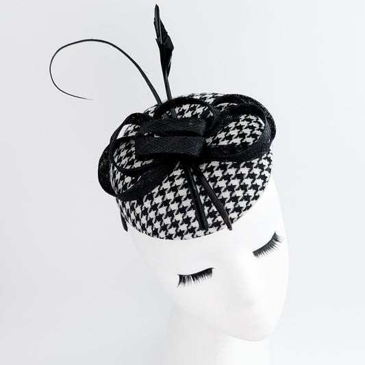 Black and white houndstooth feather fascinator hat