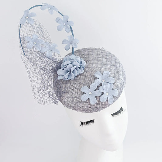 Light dusty blue flower fascinator hat House of Hats
