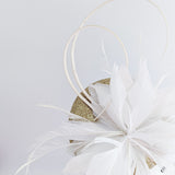 Gold glitter feather fascinator hat Gold glitter feather fascinator hat