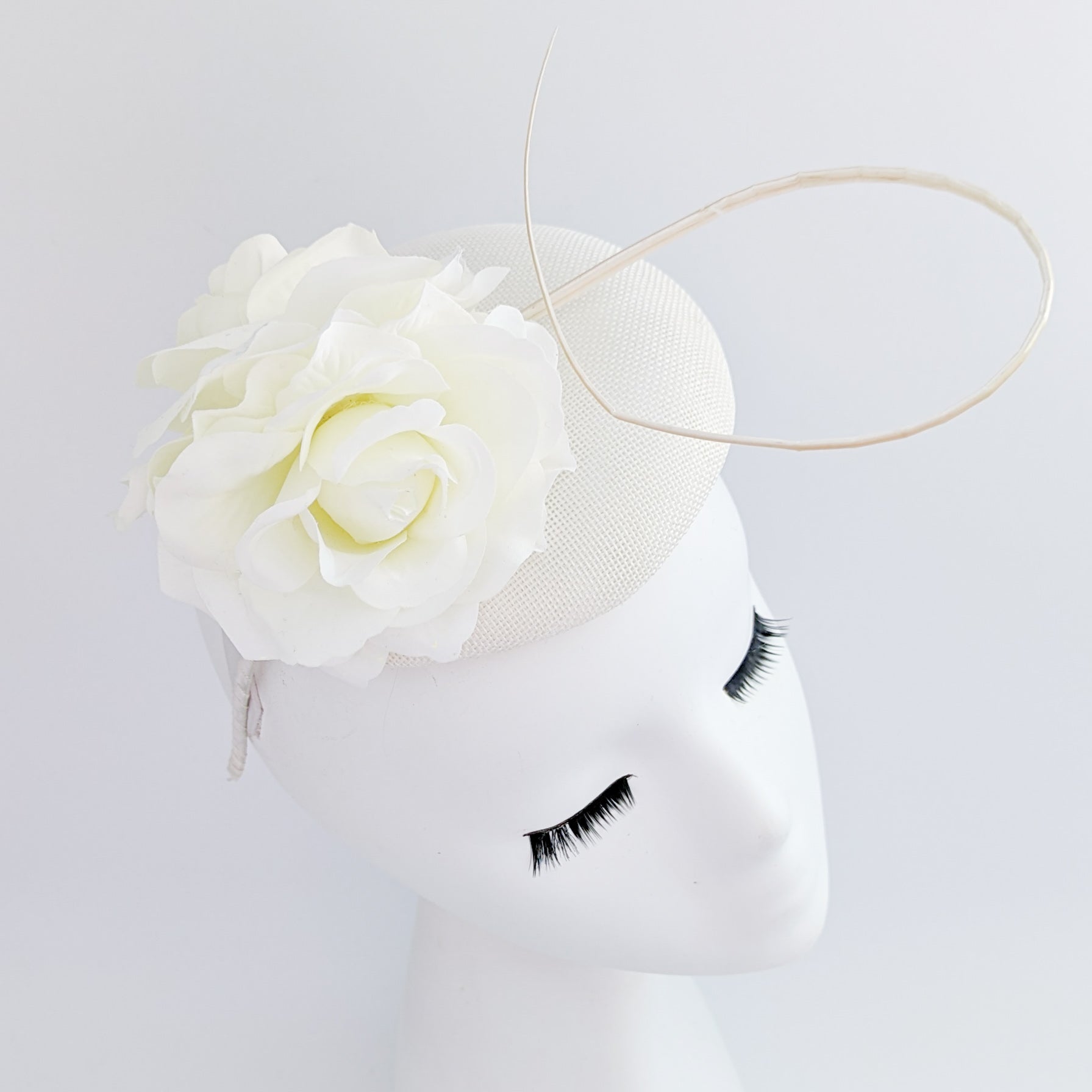 Cream rose flower fascinator hat Cream rose flower fascinator hat