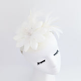 Cream feather flower fascinator hat Cream feather flower fascinator hat