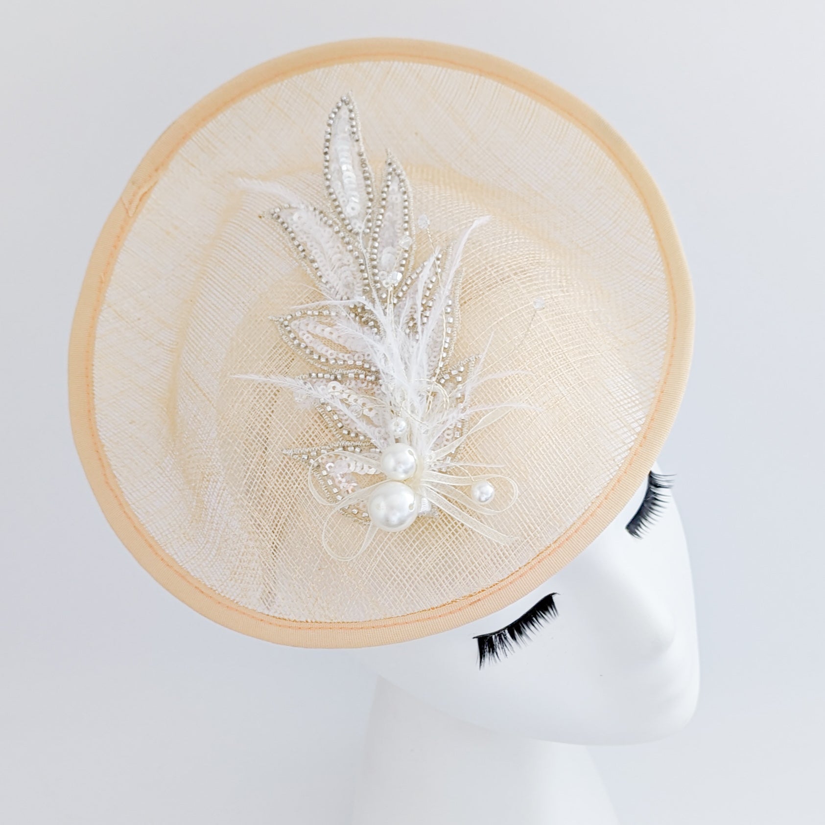 Peach crystal feather disc saucer fascinator hat Peach crystal feather disc saucer fascinator hat