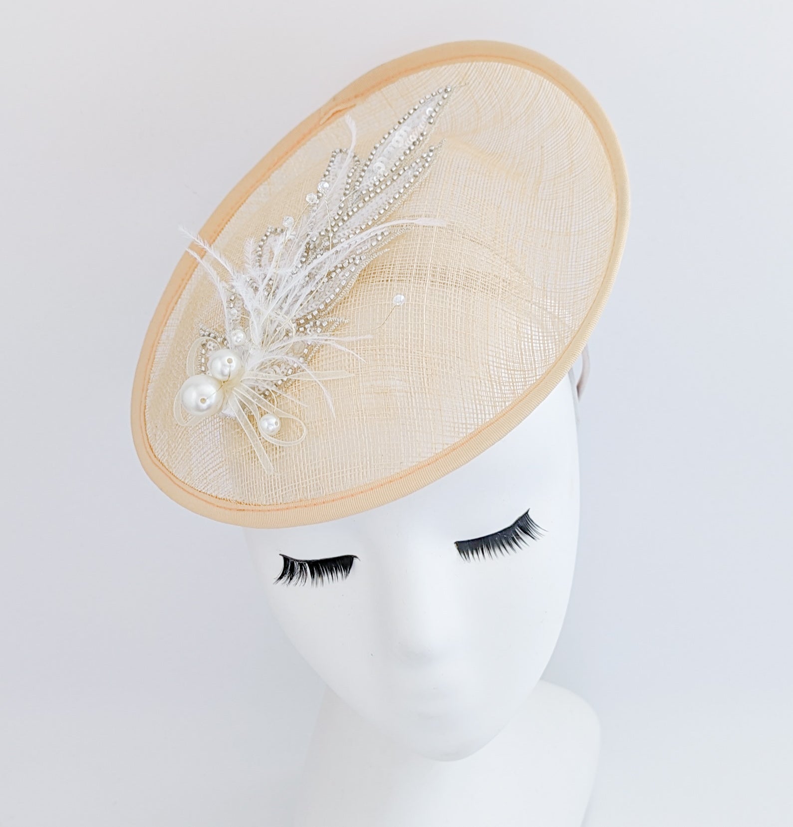 Peach crystal feather disc saucer fascinator hat Peach crystal feather disc saucer fascinator hat
