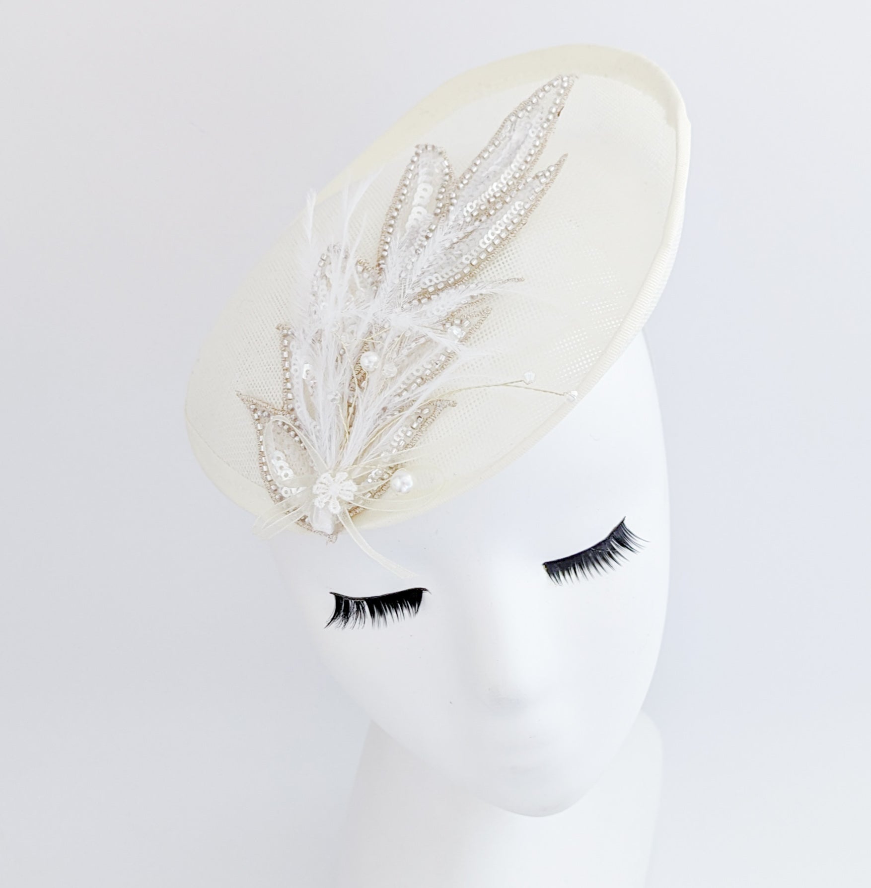 Cream crystal feather disc saucer fascinator hat Cream crystal feather disc saucer fascinator hat