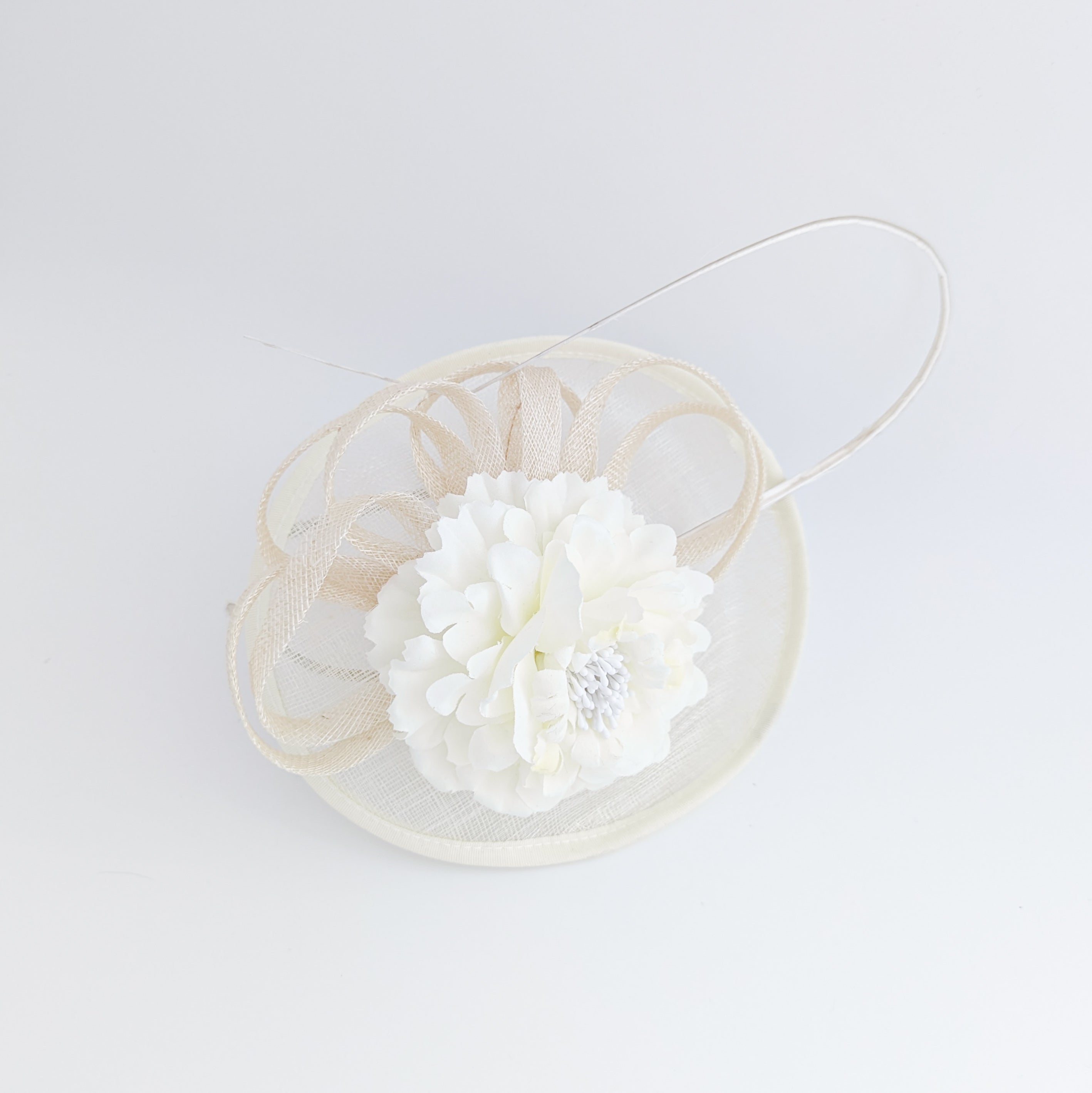 Cream flower disc saucer fascinator hat