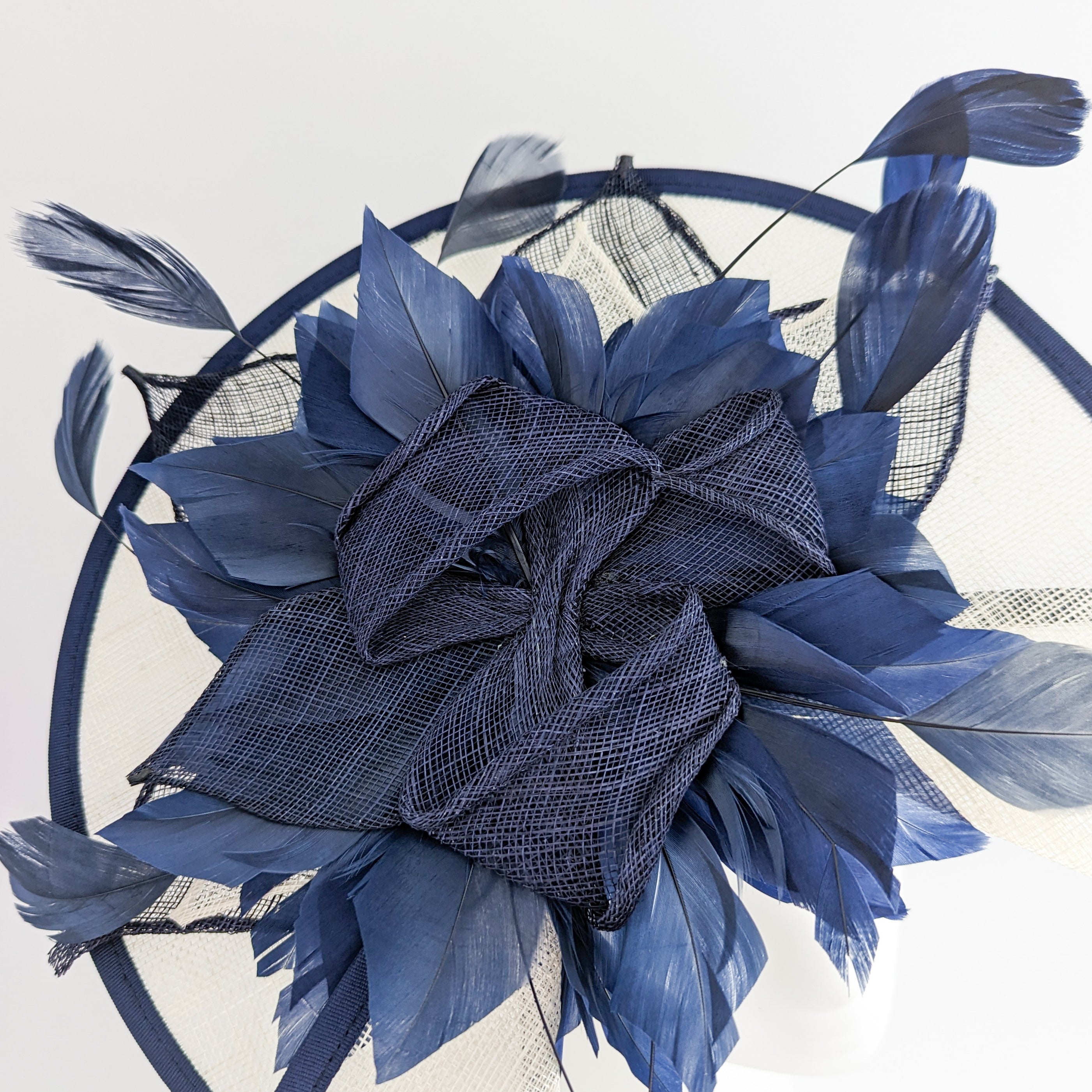 Navy ivory large feather fascinator hat Navy ivory large feather fascinator hat