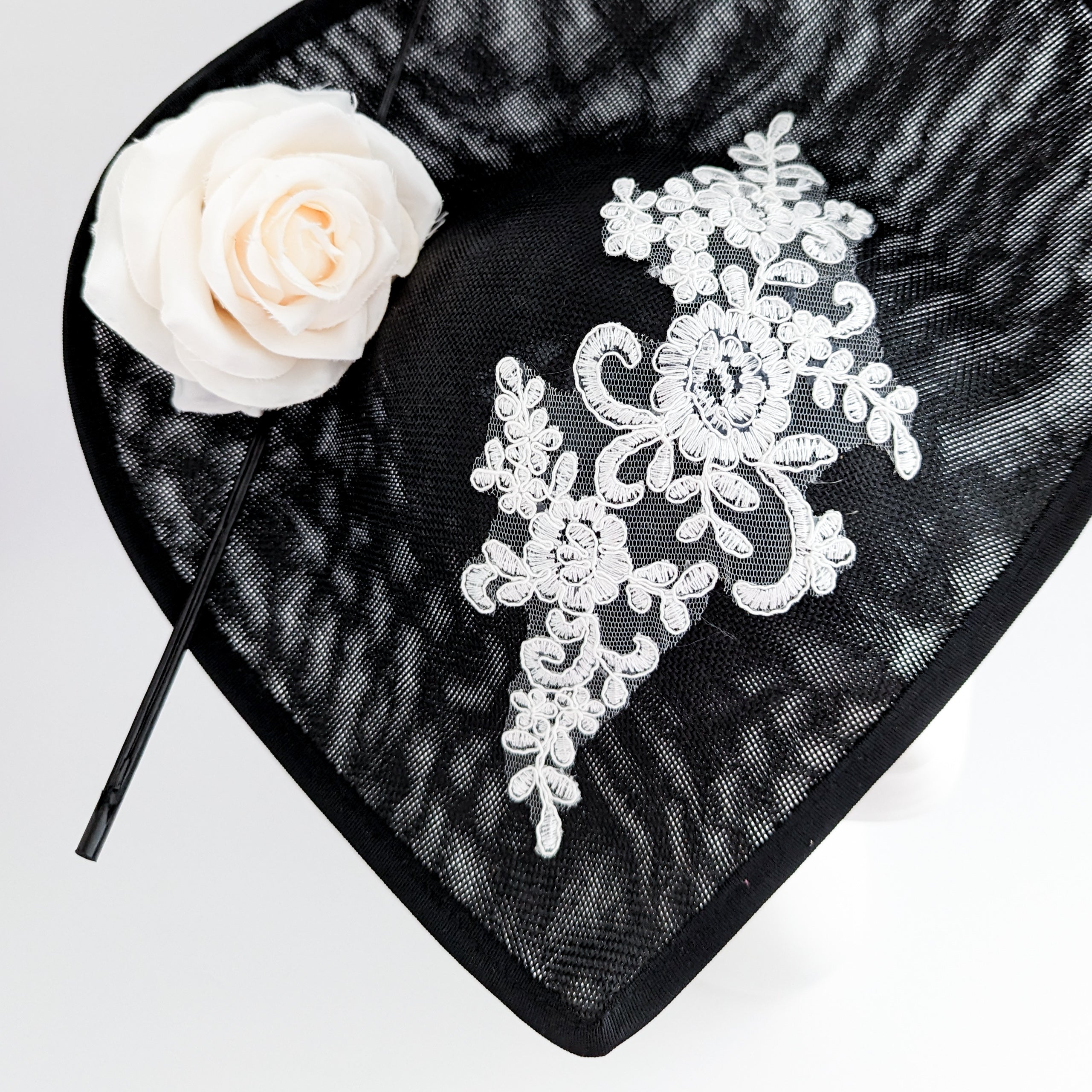 Black white large teardrop rose flower fascinator hat Black white large teardrop rose flower fascinator hat