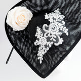 Black white large teardrop rose flower fascinator hat Black white large teardrop rose flower fascinator hat