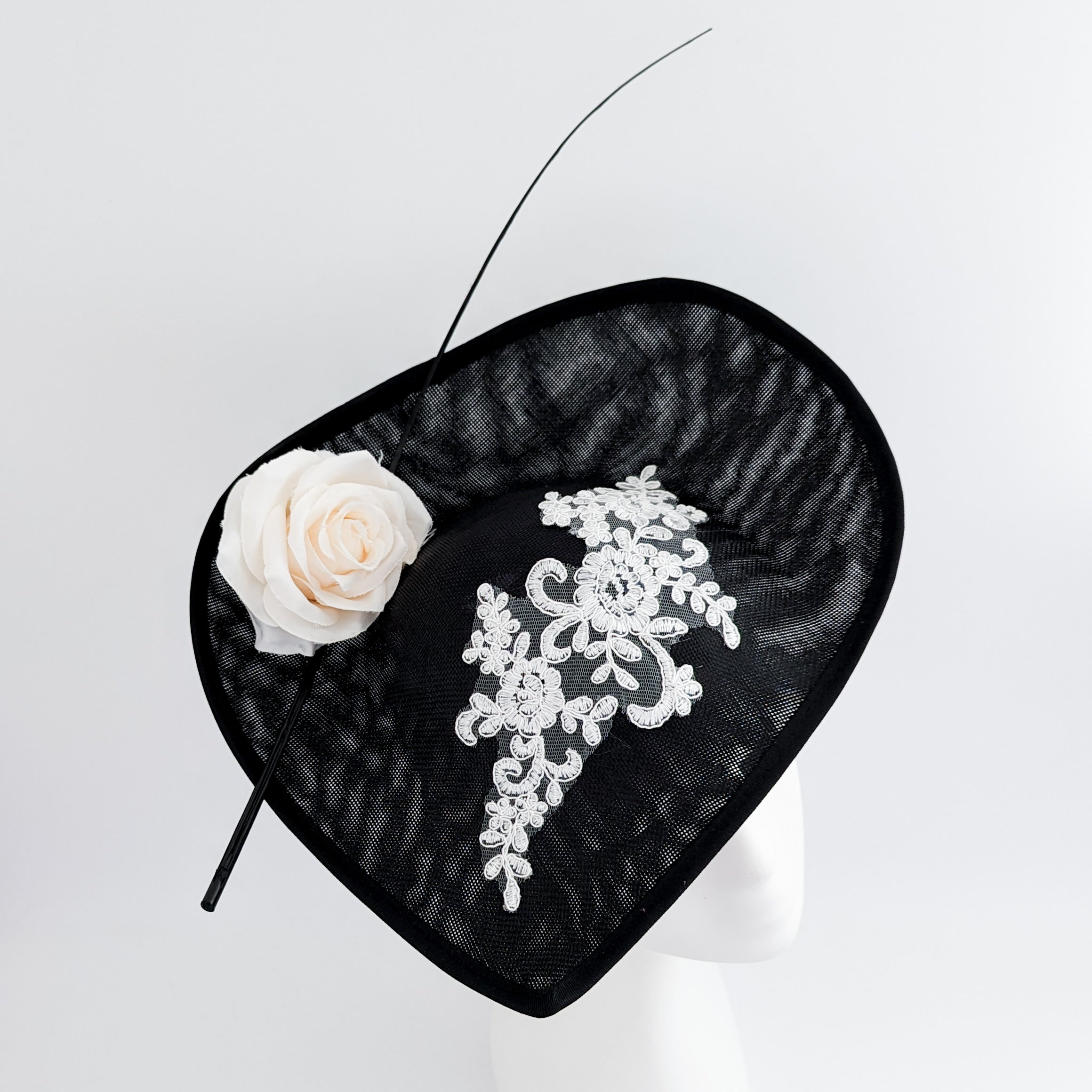Black white large teardrop rose flower fascinator hat Black white large teardrop rose flower fascinator hat
