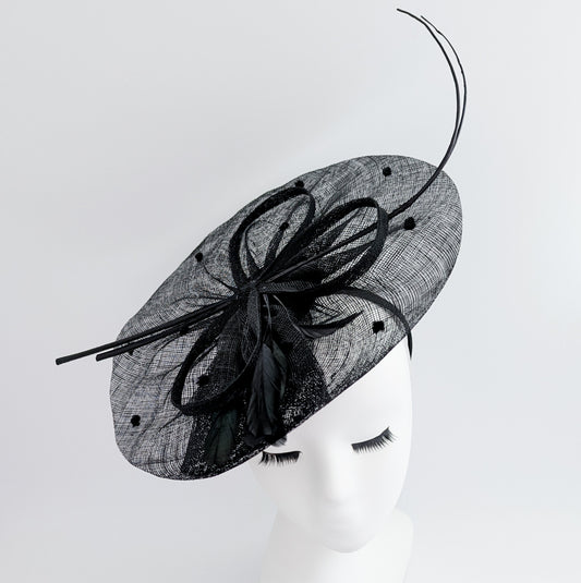 Black large feather polka dot saucer disc fascinator hat