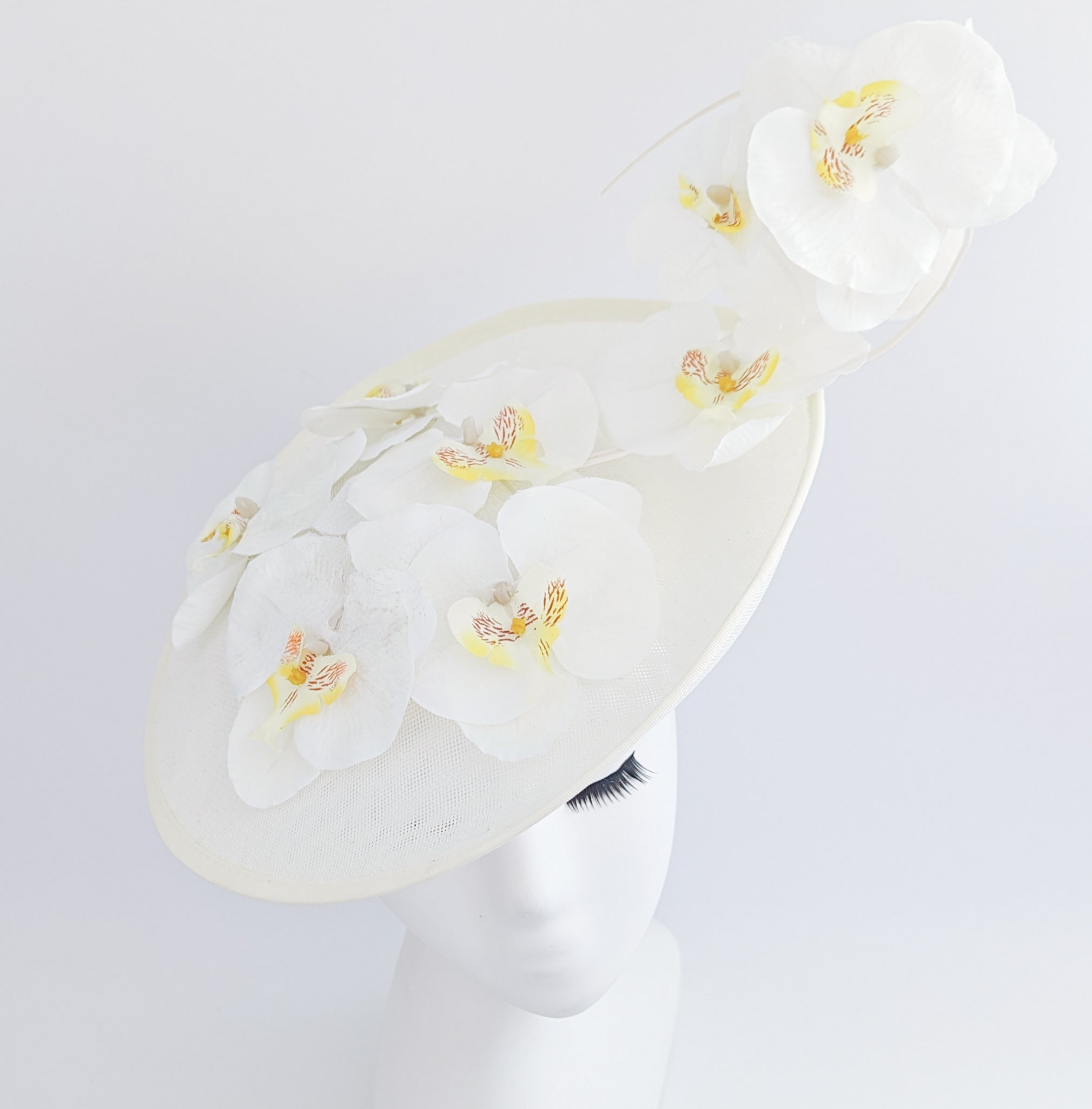 Cream large white orchid flower saucer disc fascinator hat Cream large white orchid flower saucer disc fascinator hat