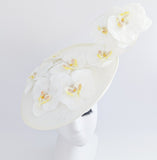 Cream large white orchid flower saucer disc fascinator hat Cream large white orchid flower saucer disc fascinator hat