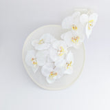 Cream large white orchid flower saucer disc fascinator hat Cream large white orchid flower saucer disc fascinator hat