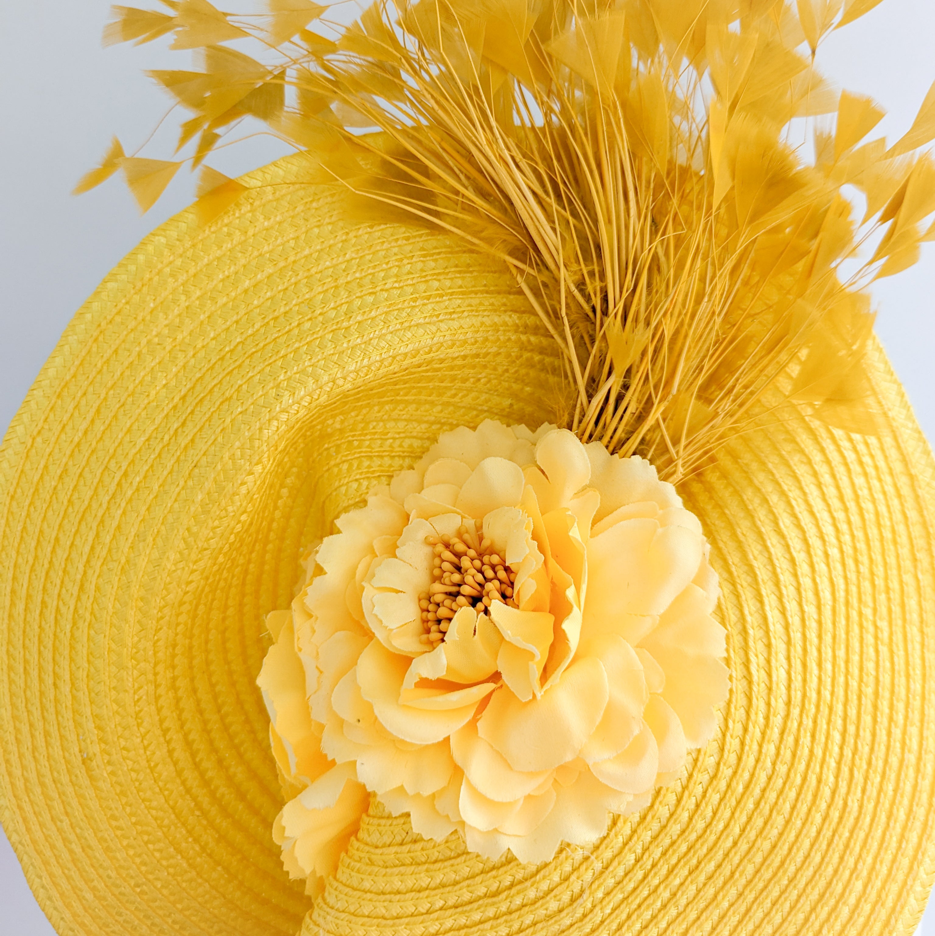 Yellow large woven straw flower feather fascinator hat Yellow large woven straw flower feather fascinator hat