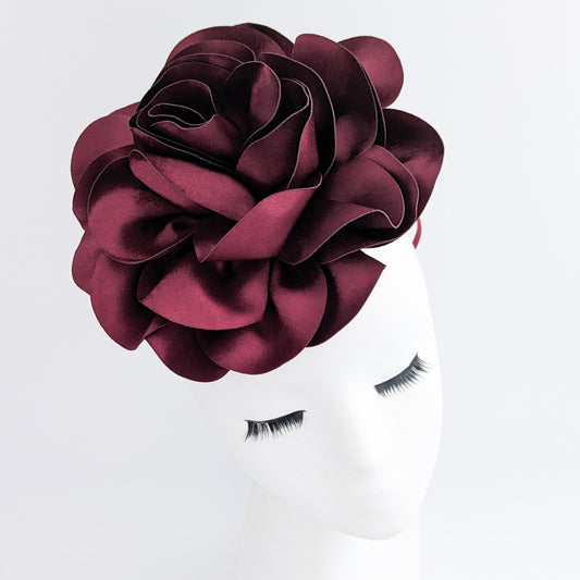 Large burgundy satin rose fascinator hat