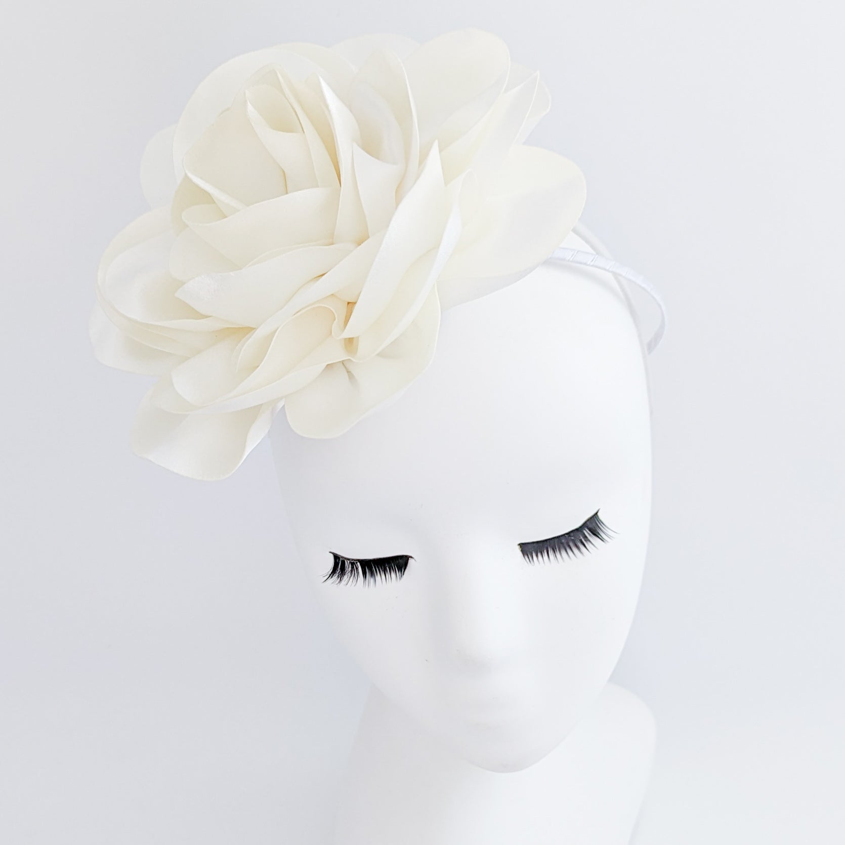 Large cream satin rose fascinator hat Large cream satin rose fascinator hat