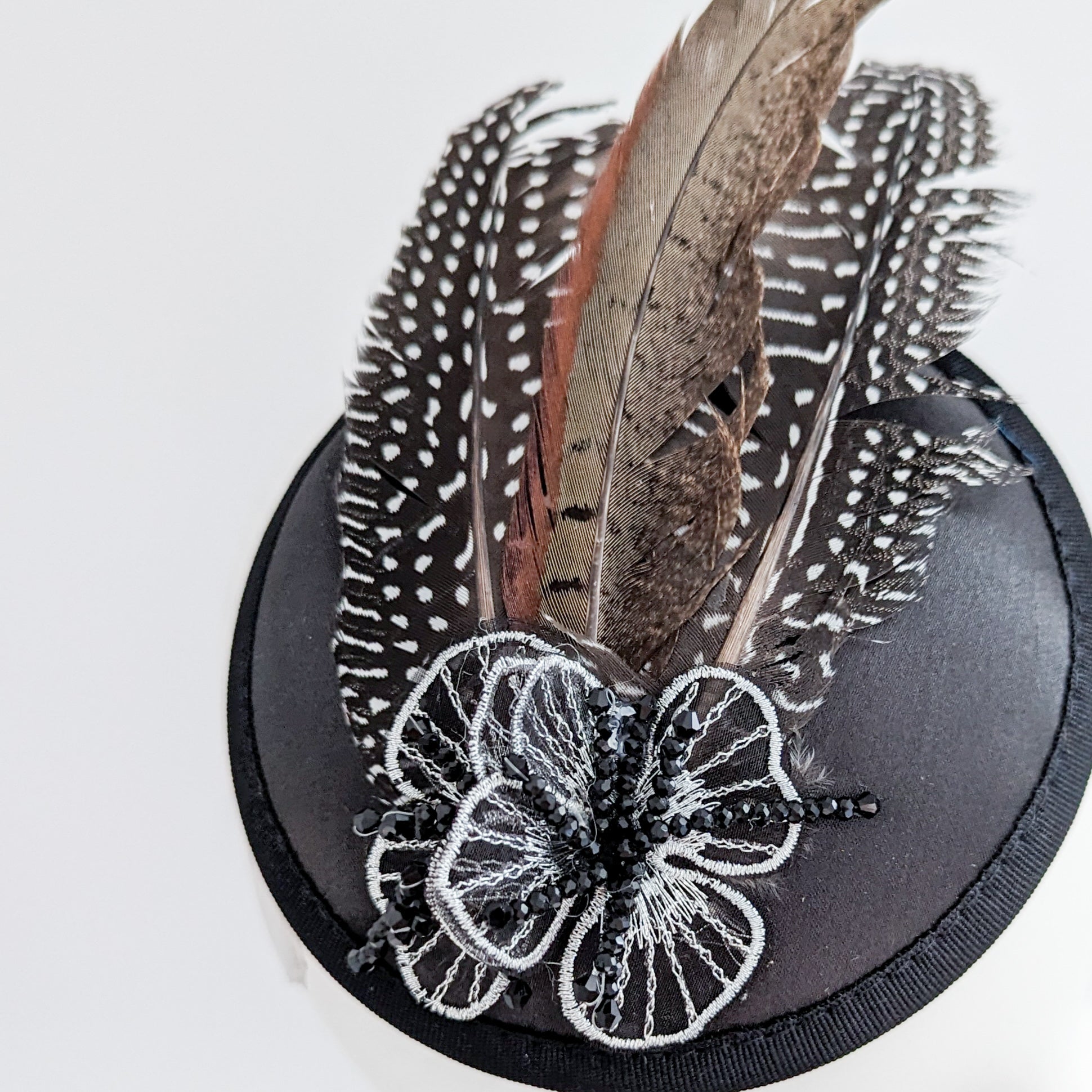 Black pheasant feather small satin fascinator  wedding hats uk Black pheasant feather small satin fascinator  wedding hats uk