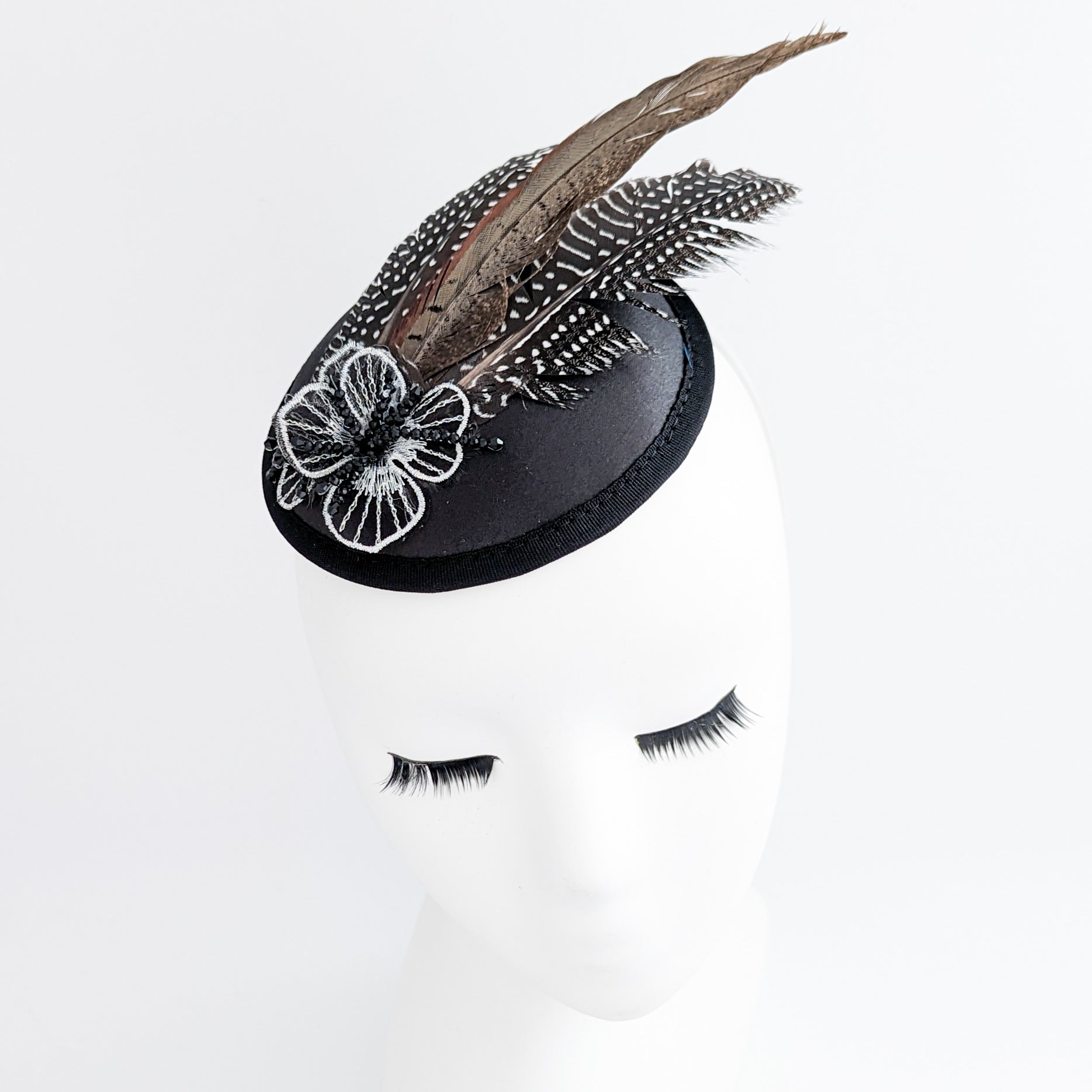 Black pheasant feather small satin fascinator  wedding hats uk