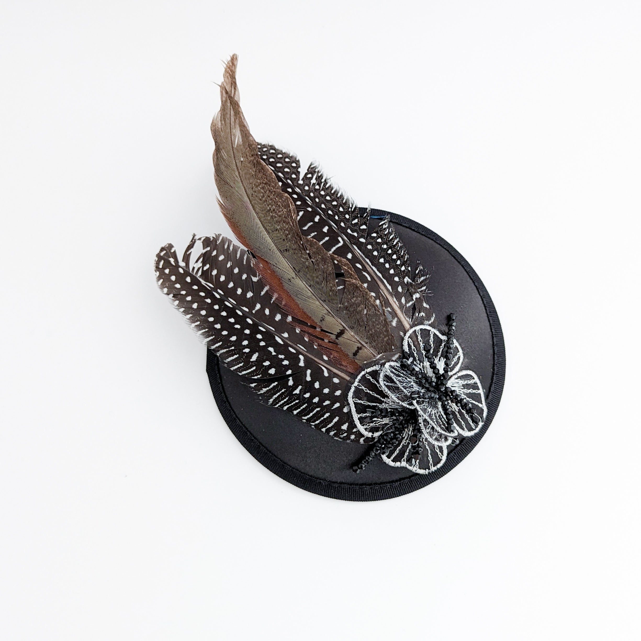 Black pheasant feather small satin fascinator  wedding hats uk