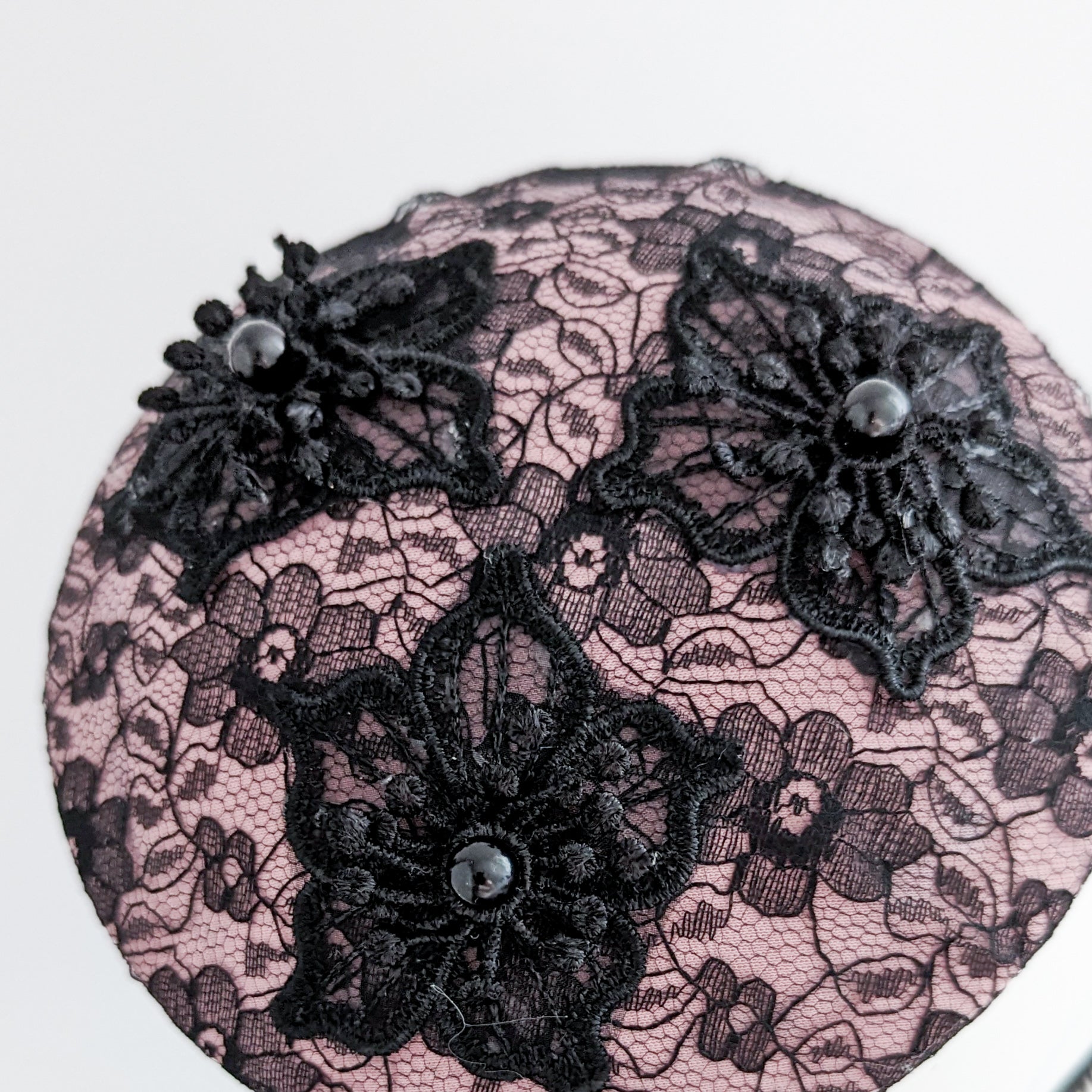 Blush pink black lace small fascinator hat Blush pink black lace small fascinator hat