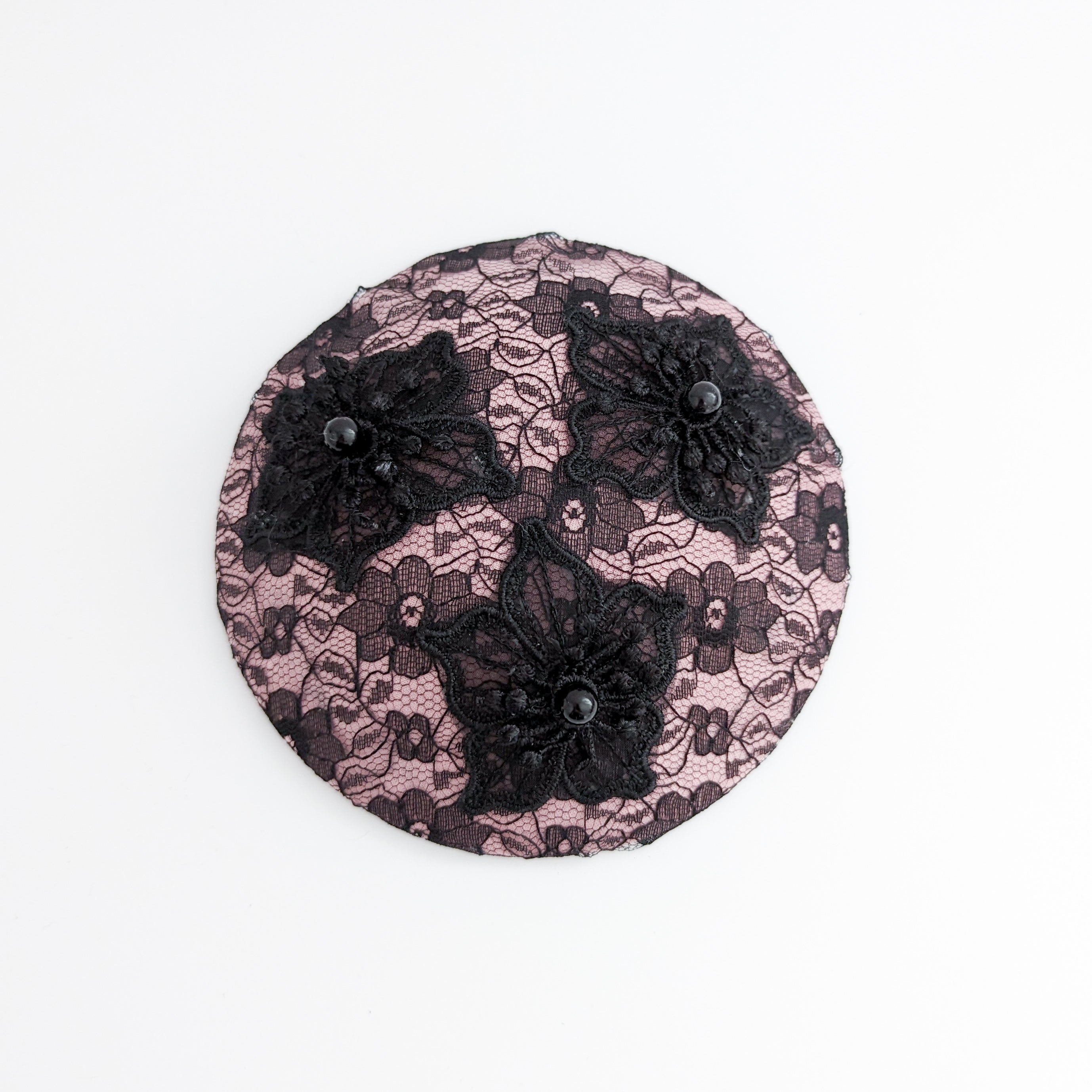 Blush pink black lace small fascinator hat Blush pink black lace small fascinator hat