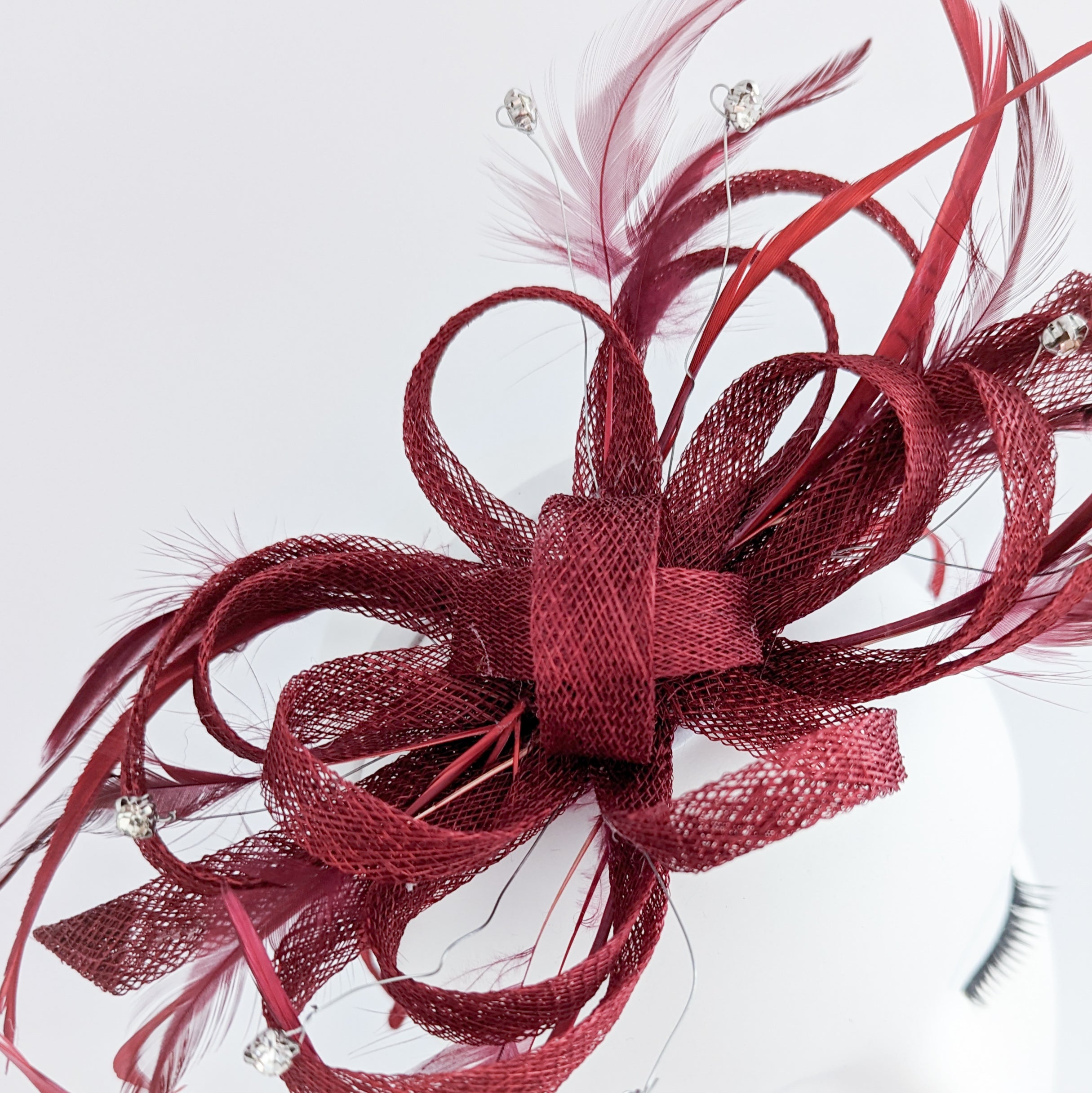 Burgundy crystal feather fascinator hat
