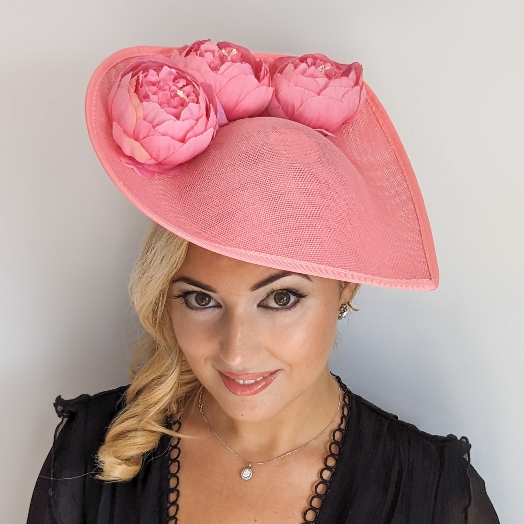 Pink large teardrop peony flower fascinator hat Pink large teardrop peony flower fascinator hat