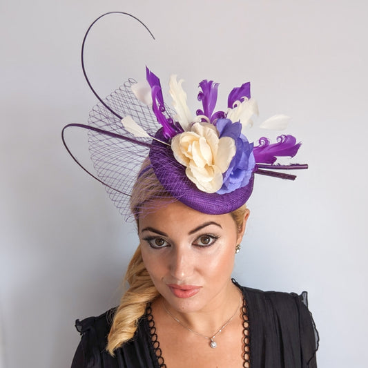 Cadbury purple flower feather fascinator hat