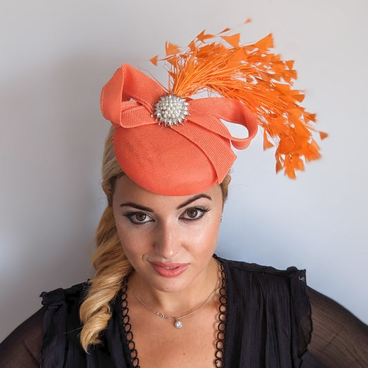 Coral orange feather pearl fascinator hat