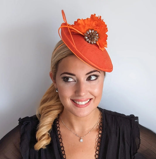 Orange flower disc saucer fascinator hat House of Hats