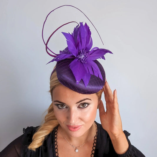 Cadbury purple feather satin fascinator hat House of Hats