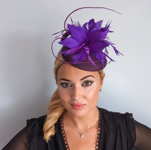 Plum and cadbury purple feather fascinator hat