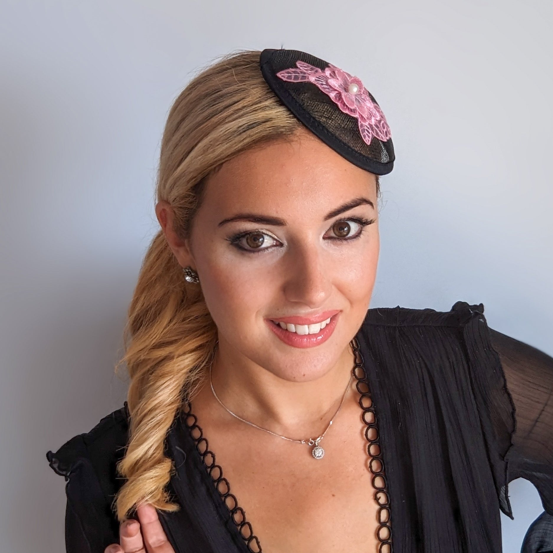 Black pink lace small fascinator hat Black pink lace small fascinator hat