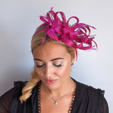 Magenta pink crystal feather fascinator hat Magenta pink crystal feather fascinator hat