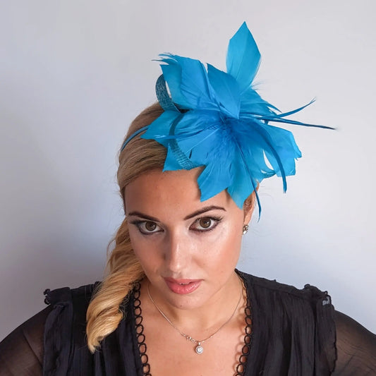 Sea blue feather fascinator hat House of Hats