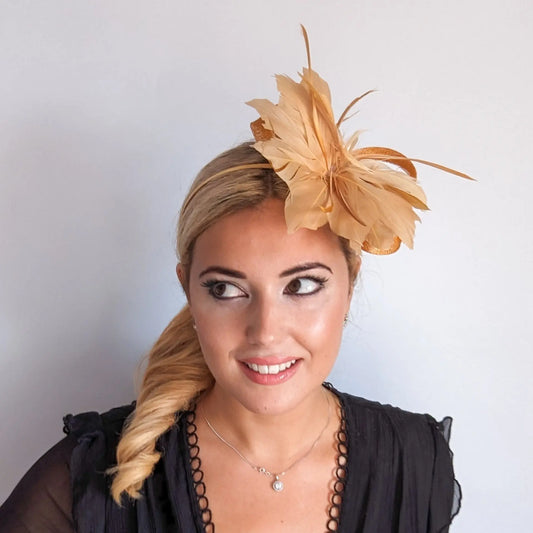 Golden yellow feather fascinator hat House of Hats