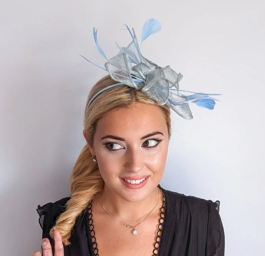 Aquamarine blue feather fascinator hat House of Hats