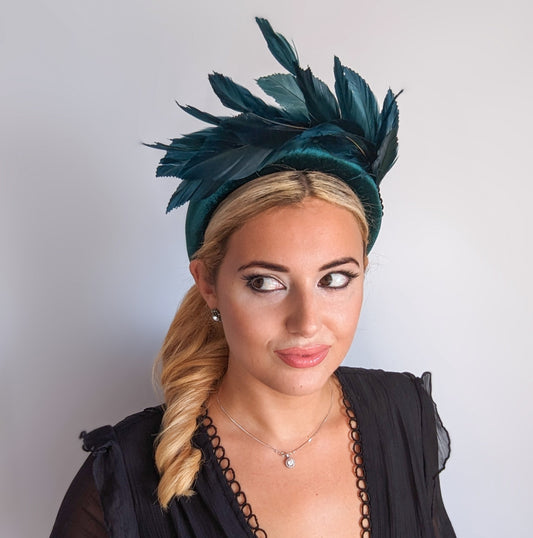 Dark emerald green feather padded velvet headband fascinator
