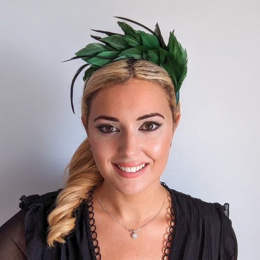 Emerald green feather satin headband fascinator