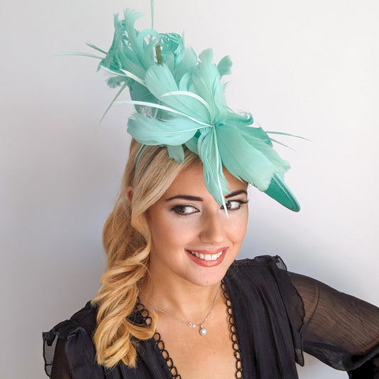 Seafoam mint green feather large saucer disc fascinator hat