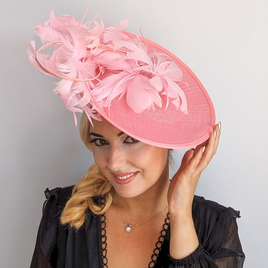 Pink large feather saucer disc fascinator hat