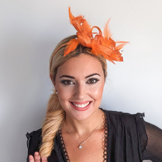 Orange crystal feather fascinator hat